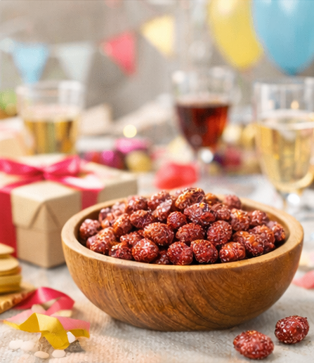 Cuenco de Capirotes en una mesa de celebración con cacahuetes garrapiñados de cacao